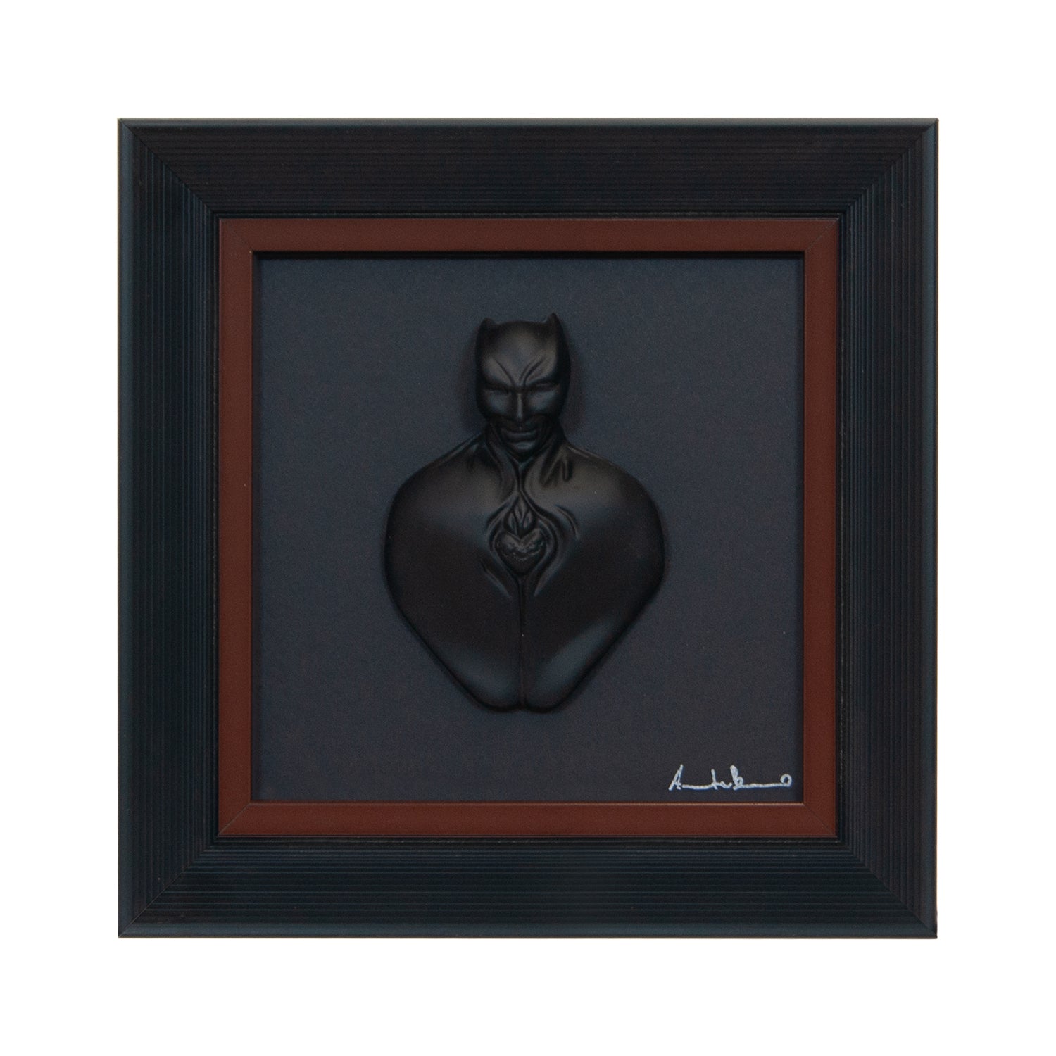 Man in black-scultura in resina opaca con bordo marrone in quadro fondo nero