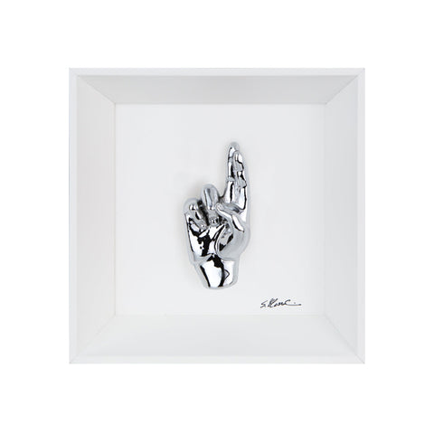 Buscìa - the language of the hands with sculpture in chromed resin on a white background painting and an Italian handcrafted frame