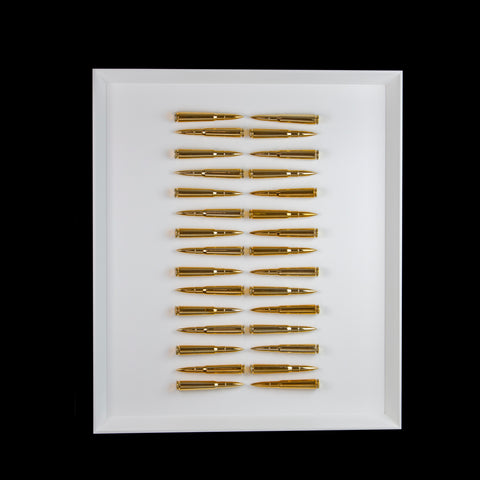 Trenta Botte - composition of bullets in colored resin on a white background frame and an Italian handcrafted frame