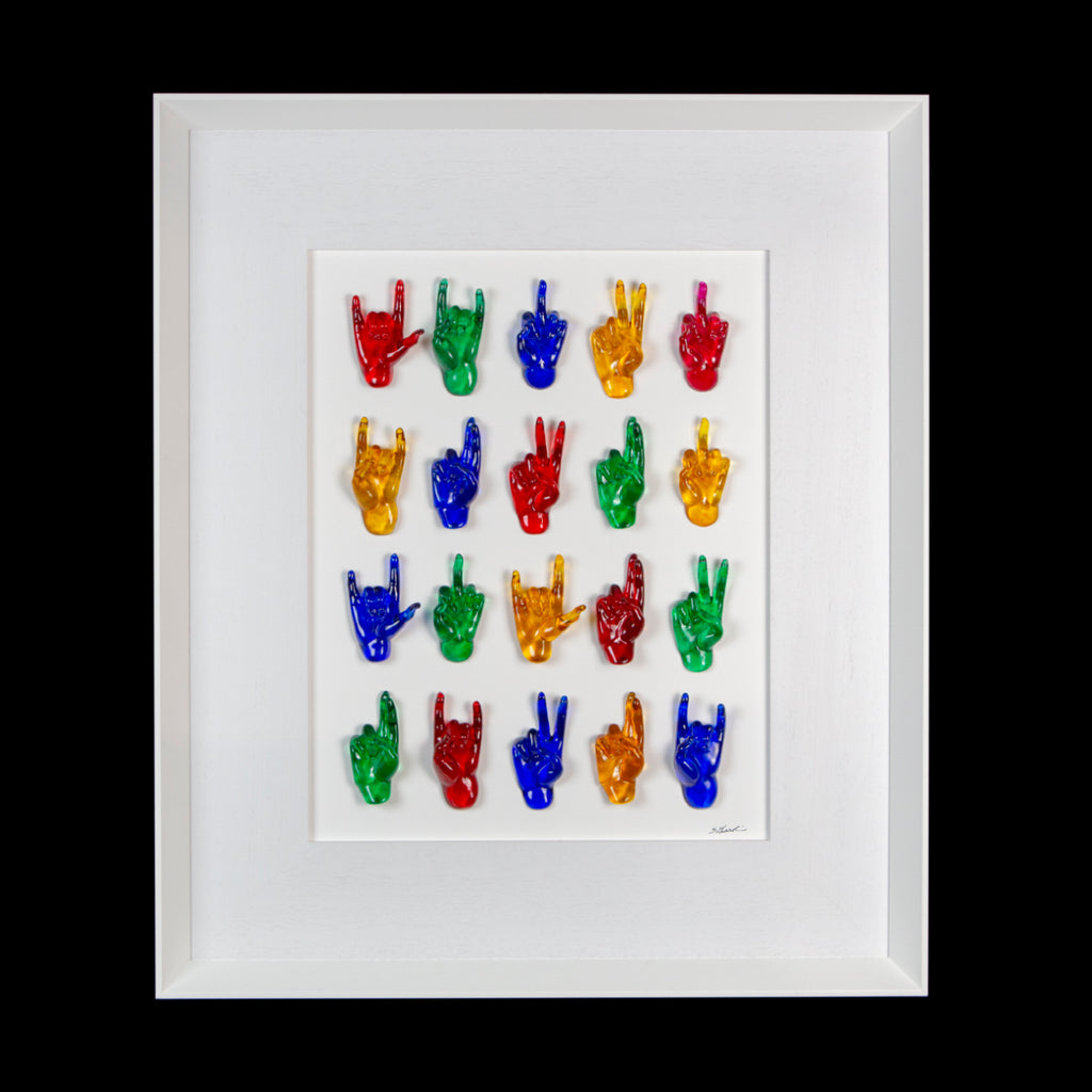 Multimani - sculptures in colored fiberglass on a white background frame with an Italian handcrafted frame