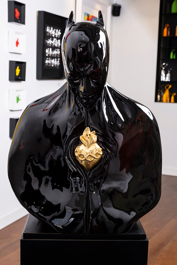 Batman - sculpture in glossy resin with the sacred heart of Jesus