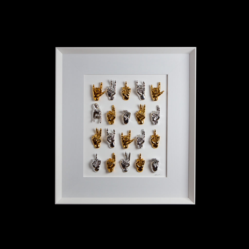 Multimani - sculptures in shiny silver and gold resin on a white background frame with an Italian handcrafted frame