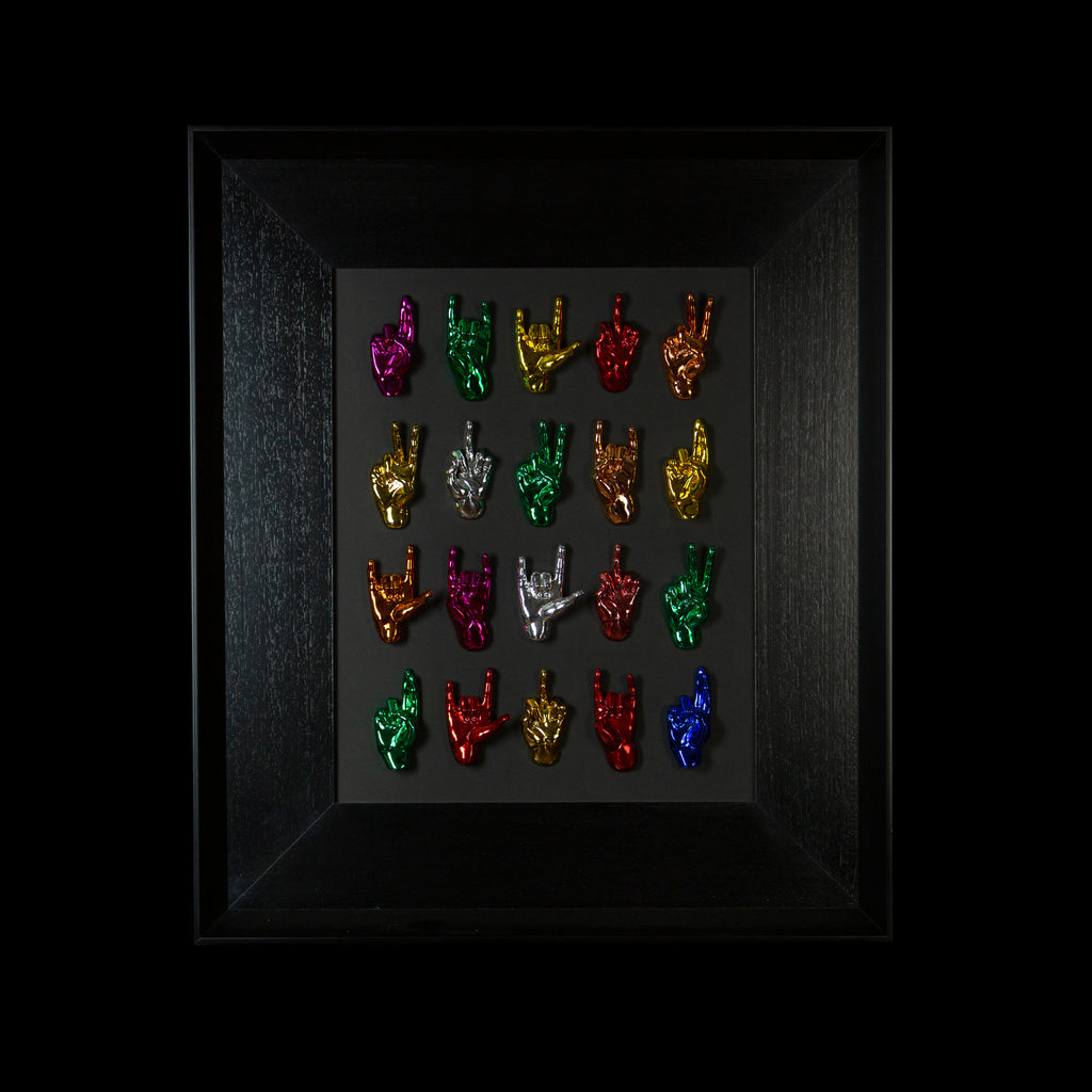 Multimani - sculptures in colored fiberglass on a black background frame with an Italian handcrafted frame